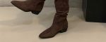 Pair of brown pointed-toe suede slouch mid-calf boots