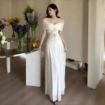 Ivory off-shoulder lace-panel maxi dress, full-length indoor view